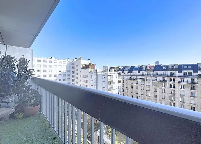 With Balcony Overlooking The Eiffel Tower
