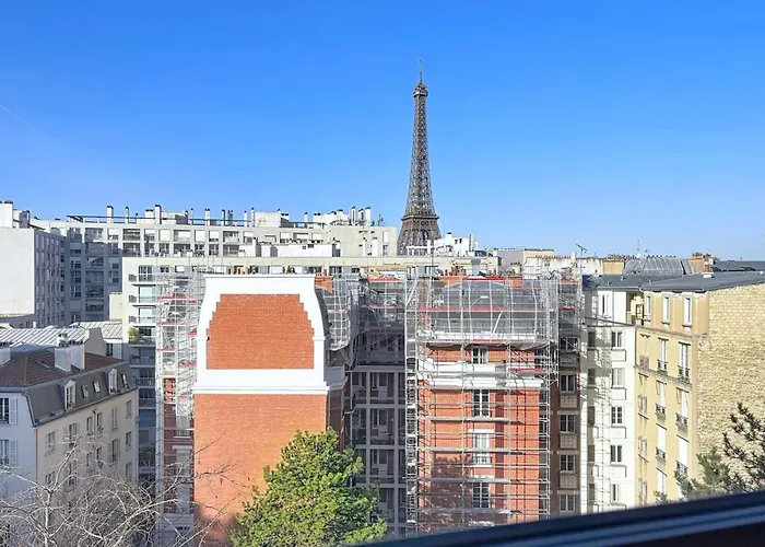 With Balcony Overlooking The Eiffel Tower